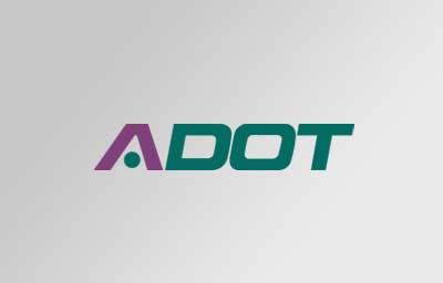 ADOT logo with a stylized purple A and green DOT on a light gray gradient background.