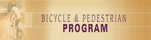 Banner with text Bicycle & Pedestrian Program and a faded image of a person riding a bicycle on the left.