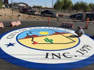 San Luis seal painted on pavement