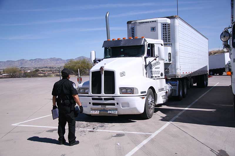 ADOT officer inspects semitrailer
