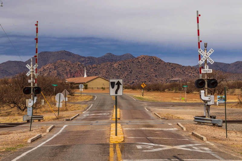 Street with a railroad crossing