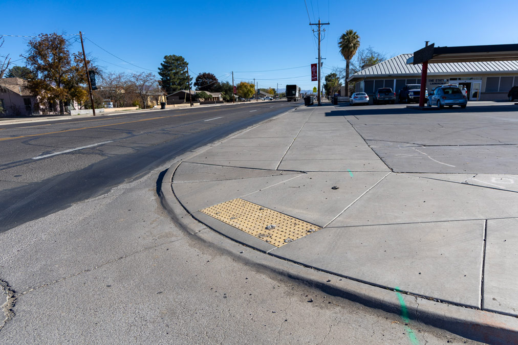 Newly constructed concrete sidewalk and ADA-compliant curb ramp along US 70 between Reay Lane and 8th Street in Thatcher and Safford, Arizona.