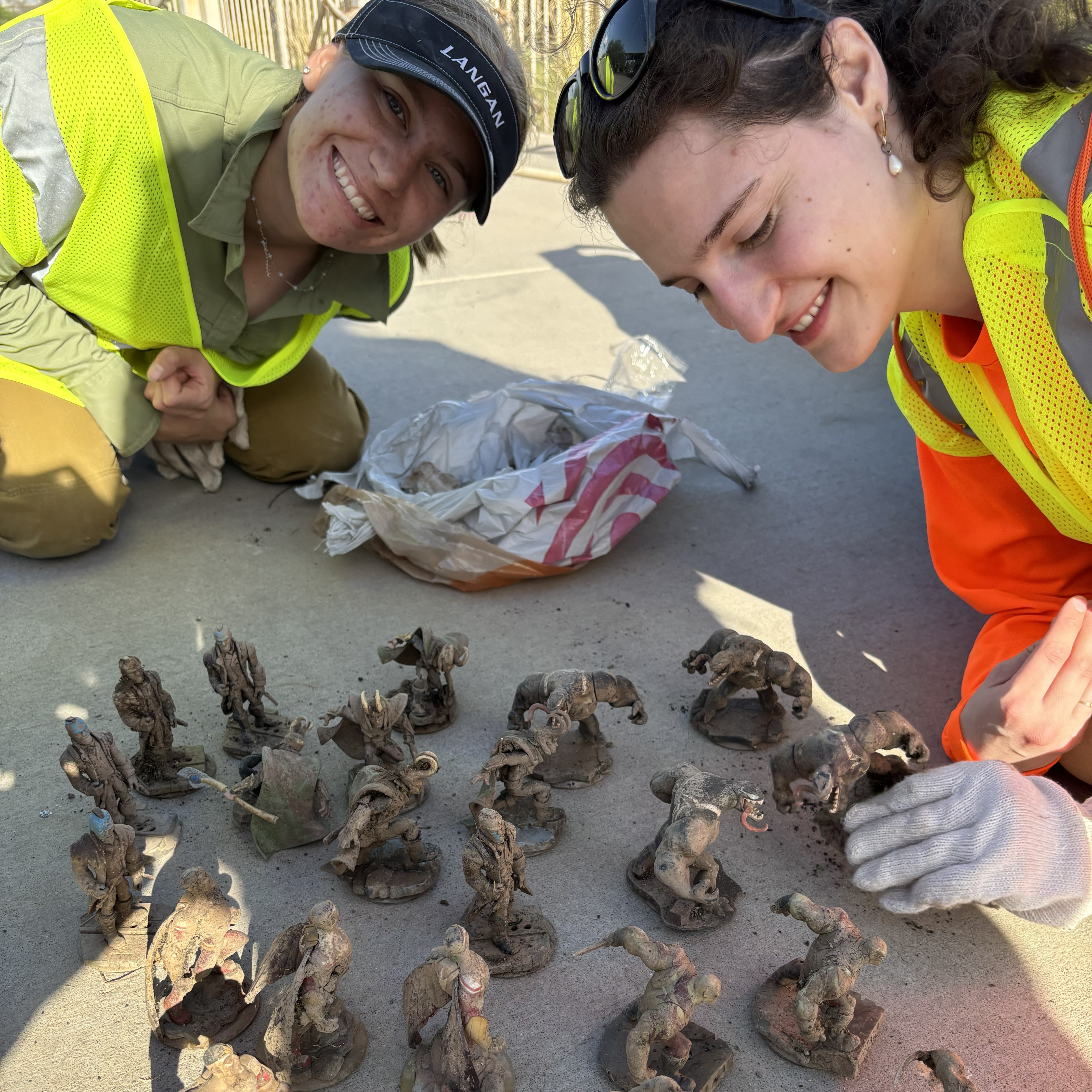 Adopt a Highway volunteers with found action figures