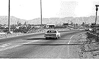 Dust storm showing car on road