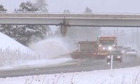 Image of snow plow on highway