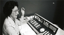 1970s photo of woman operating old phone system