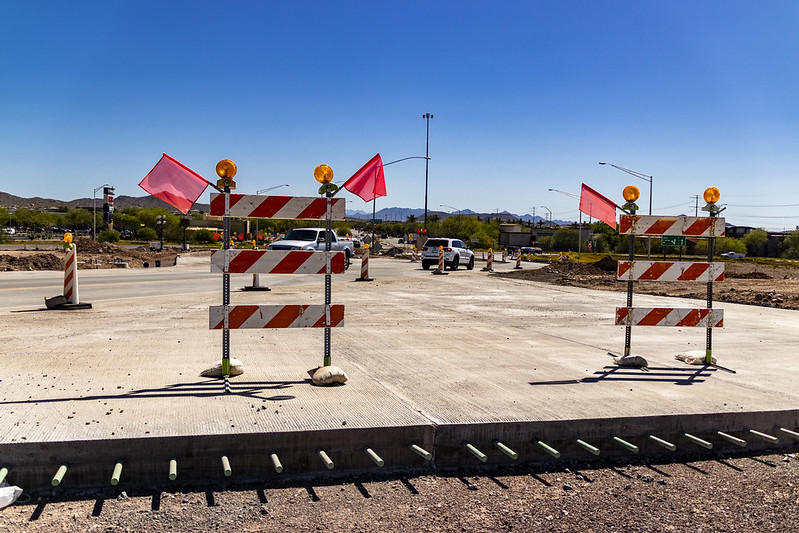 Construction zone with barricades and flags
