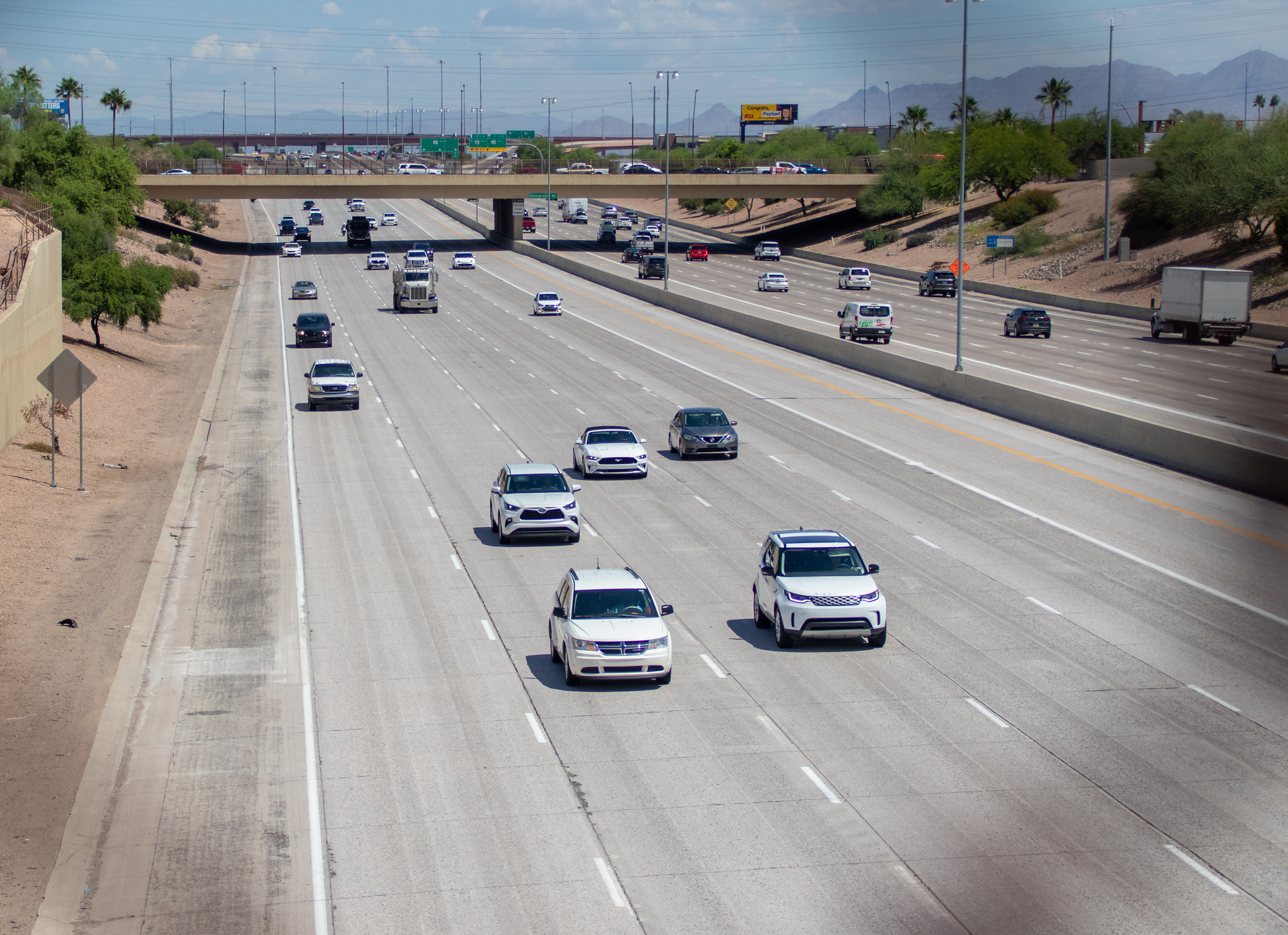 Cars driving on a highway. 