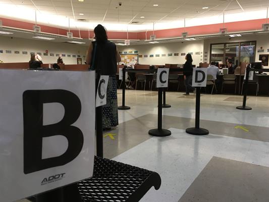 MVD office interior showing one person in line