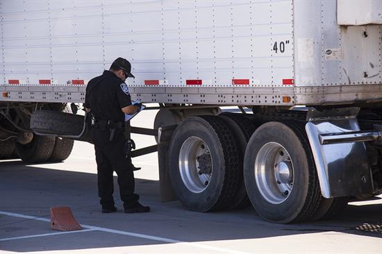 ECD performing truck inspection