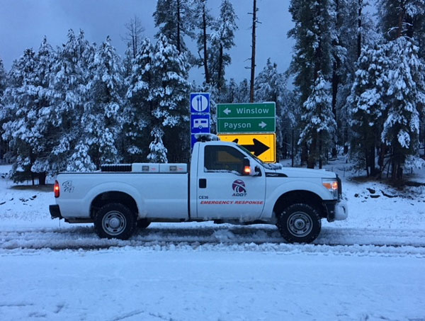 Emergency response pick up truck on a snowy road