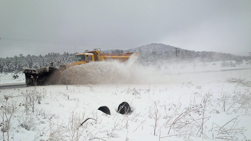 snowplow at work in the snow up north