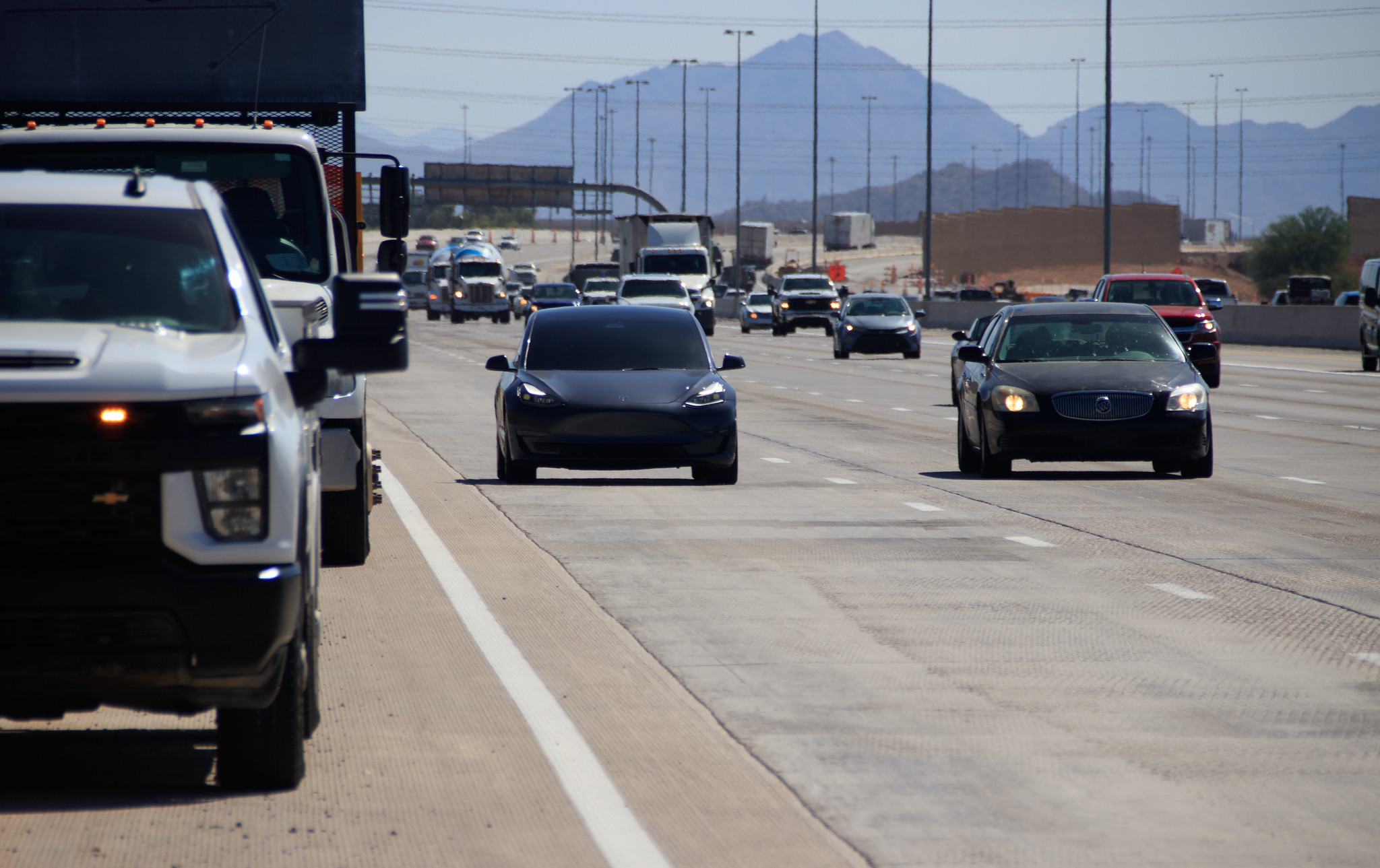 Vehicles driving on the highway. 