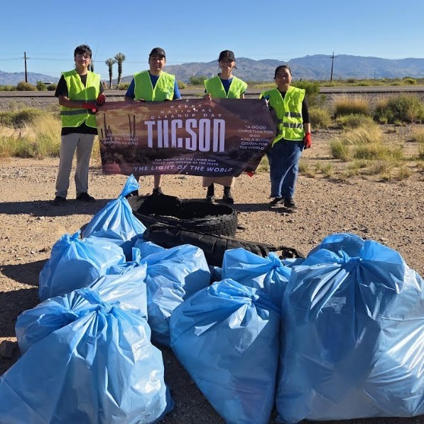 AAH four Tucson volunteers and bagged trash