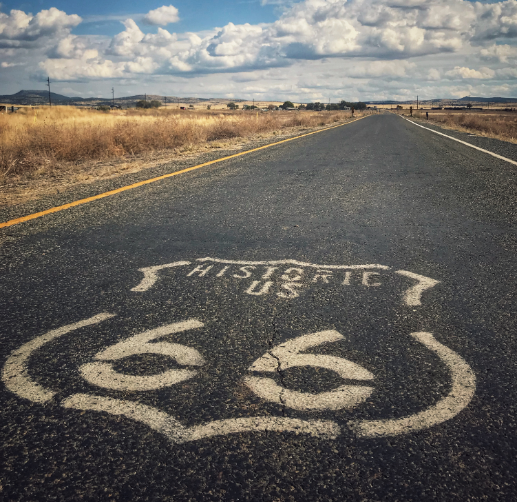 Image of Route 66 shield painted on roadway