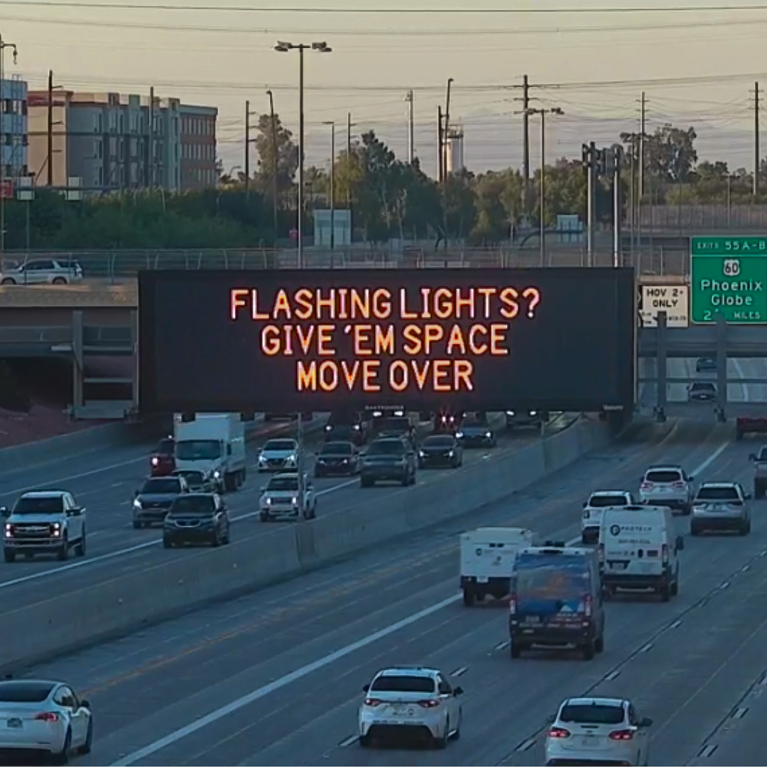 A digital highway sign that encourages drivers to move over.