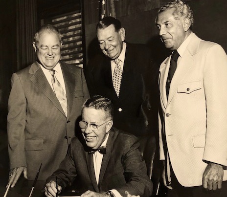 Justin Herman, center back, watches then-Gov. Jack Williams declare "Highway Week" 