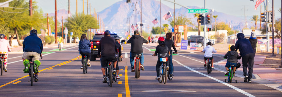 Bicyclists enjoy Avenida del Yaqui's new designated bike lane photo