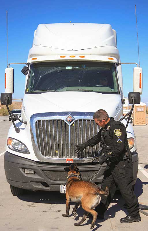 ADOT K-9 checking commercial truck for illegal imports