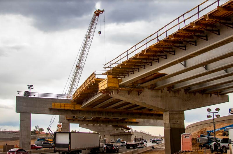 Final girder of nearly 200 support beams installed for I-10/Loop 202 connection