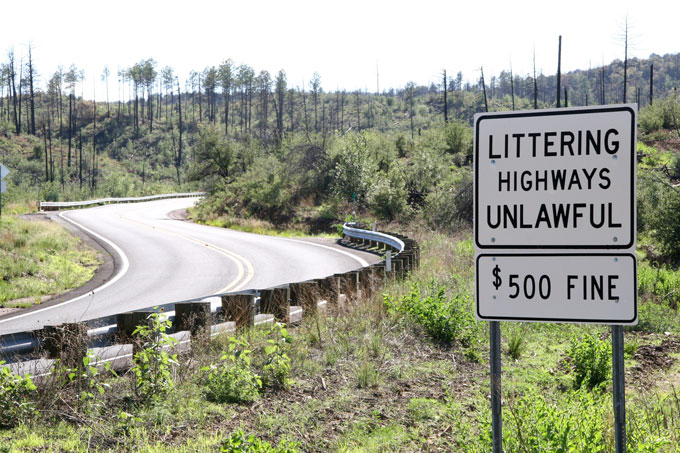 Sign along state highway - Littering Highways Unlawful $500 Fine 