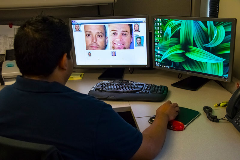 Trained staff review driver license photo flagged by facial recognition software