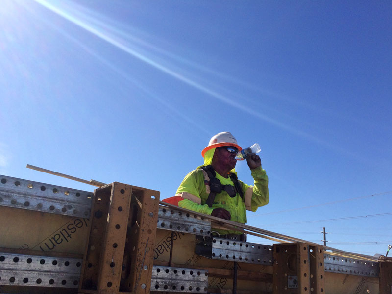ADOT Worker drinking water on a sunny day