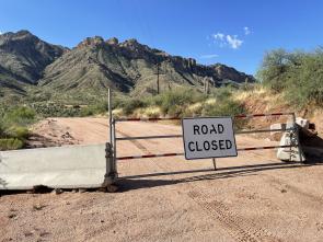 Road closed sign and gate on State Route 88