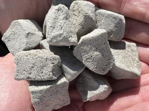 Foam glass in a person's hand.