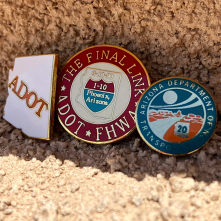 Three pins in the sunshine.