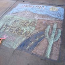 Chalk art of a desert scene.