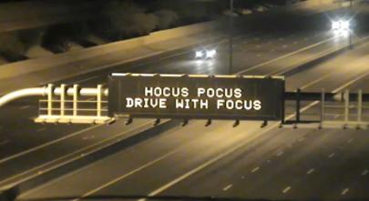 A digital message board on the highway encourages motorists to drive with focus.