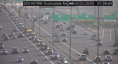 A parade of tow trucks on the highway