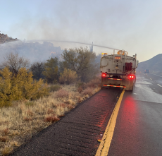 ADOT tanker sprays water on fire