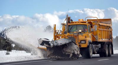 ADOT snowplow clearing highway