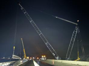 Setting girder for I-40 bridge