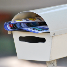 A mailbox with mail in it