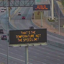 Digital message boards on the highway encourages motorists to slow down and put the phone down