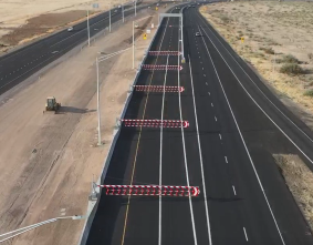 Swing gates that keep vehicles from going the wrong direction in I-17 flex lanes