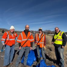 Four volunteers cleaning US 89