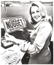 Peggy Wallace with her personalized license plate which says "Nugget."