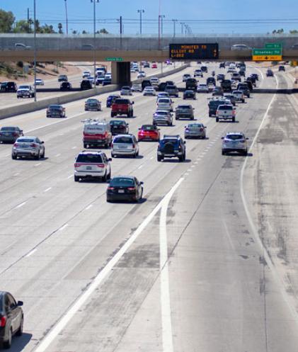 Arizona highway with multiple vehicles traveling on the road