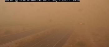 Dust storm reduces visibility on Interstate 10, viewed through traffic camera.