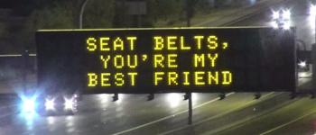 DMS messaging sign saying seat belts you're my best friend