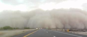 Dust cloud crossing freeway