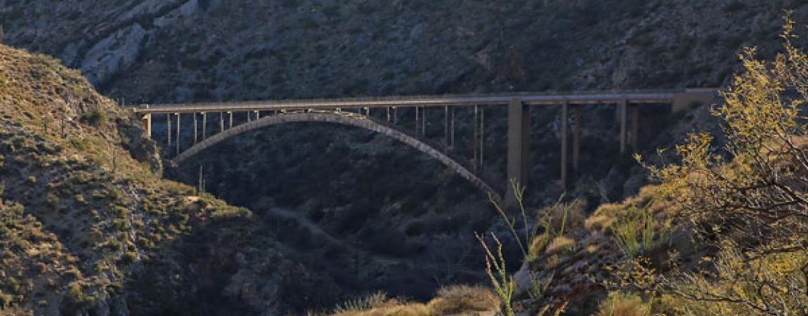 aerial photo from far away of an arizona bridge 