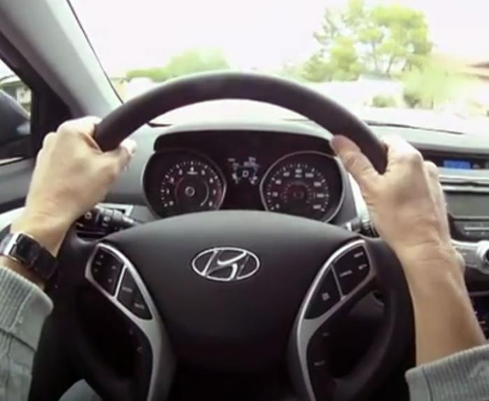 Hands on steering wheel