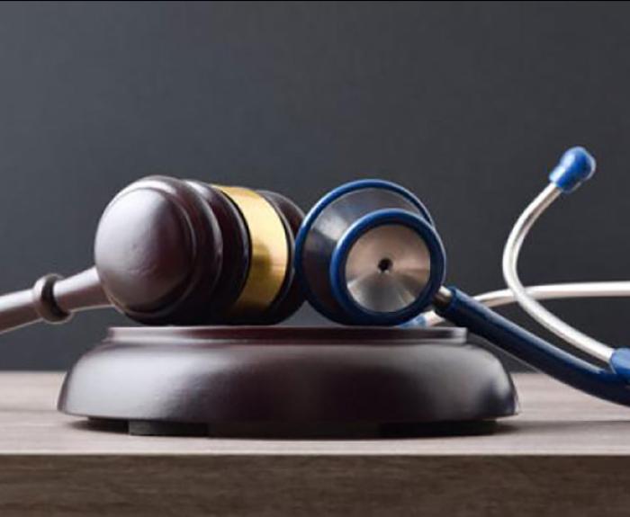 Medical review stethoscope and gavel