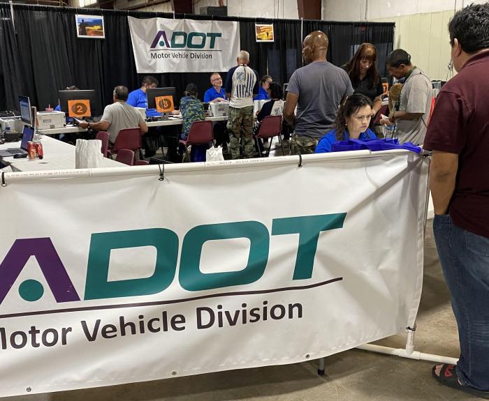 Arizona MVD staff are assisting people getting a driver license or state ID card.