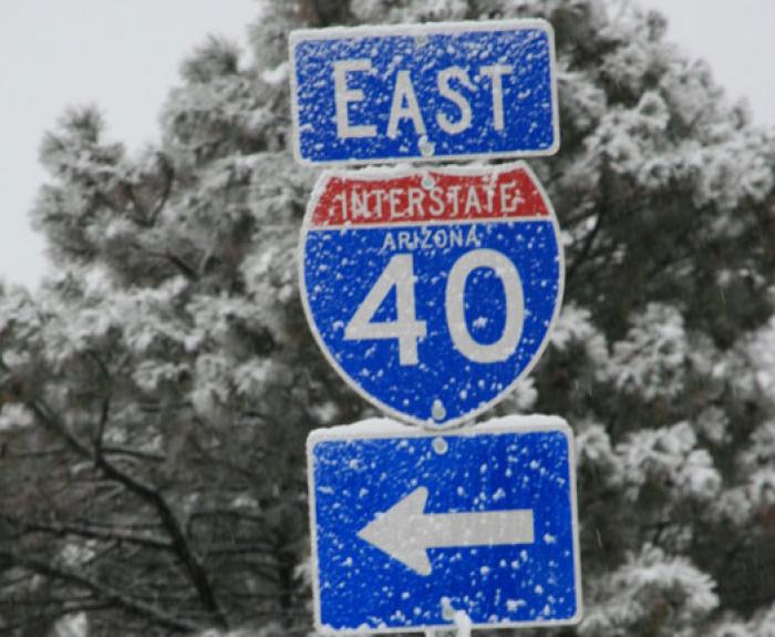 Photo of SR40 highway sign under snowfall